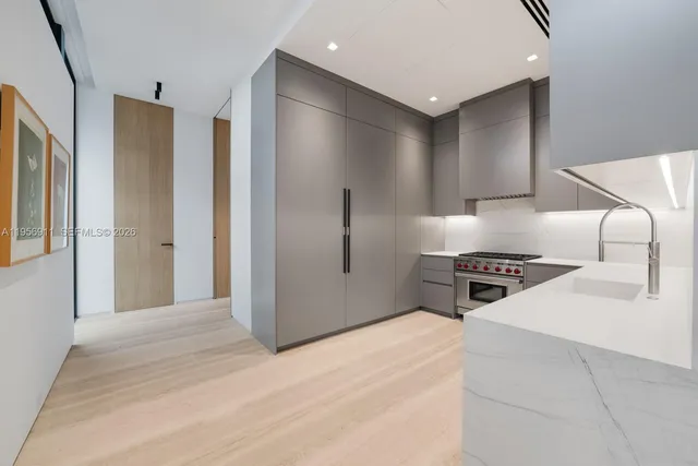 a living room with furniture tv and a flat screen tv