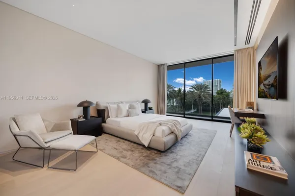 a backyard of a house with lots of green space and plants