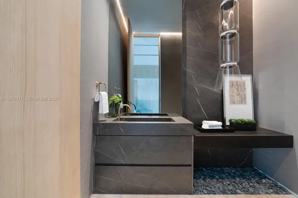 a view of swimming pool with seating space