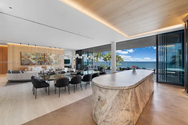 a kitchen with stainless steel appliances a sink and a refrigerator