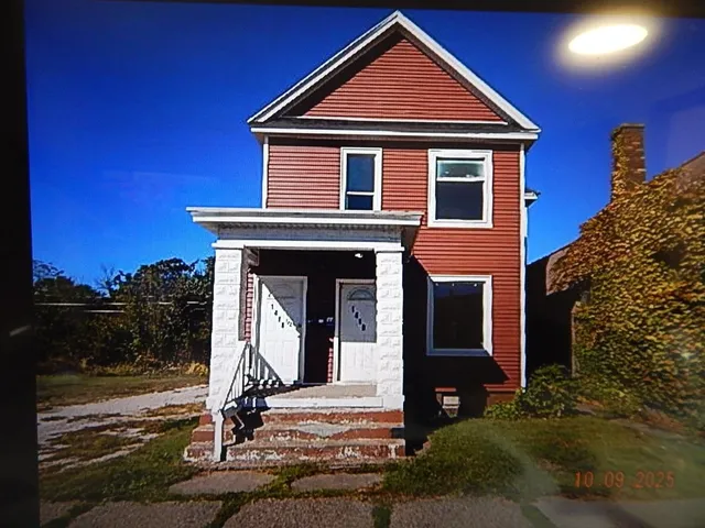a front view of a house with a porch