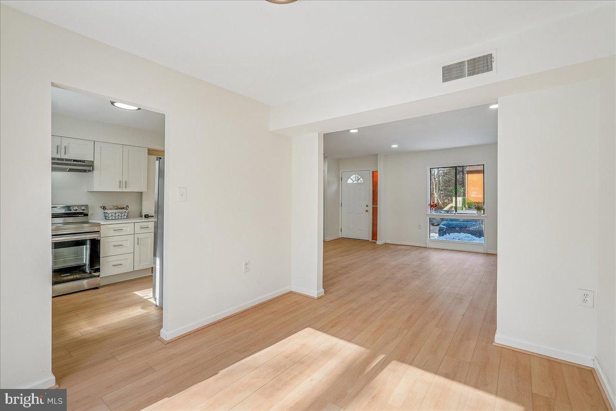 2315 Emerald Heights Court Reston, VA 20191 - Photo 11 of 36 Dining Room to Kitchen and Living Room