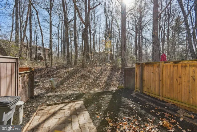 a view of a backyard of the house