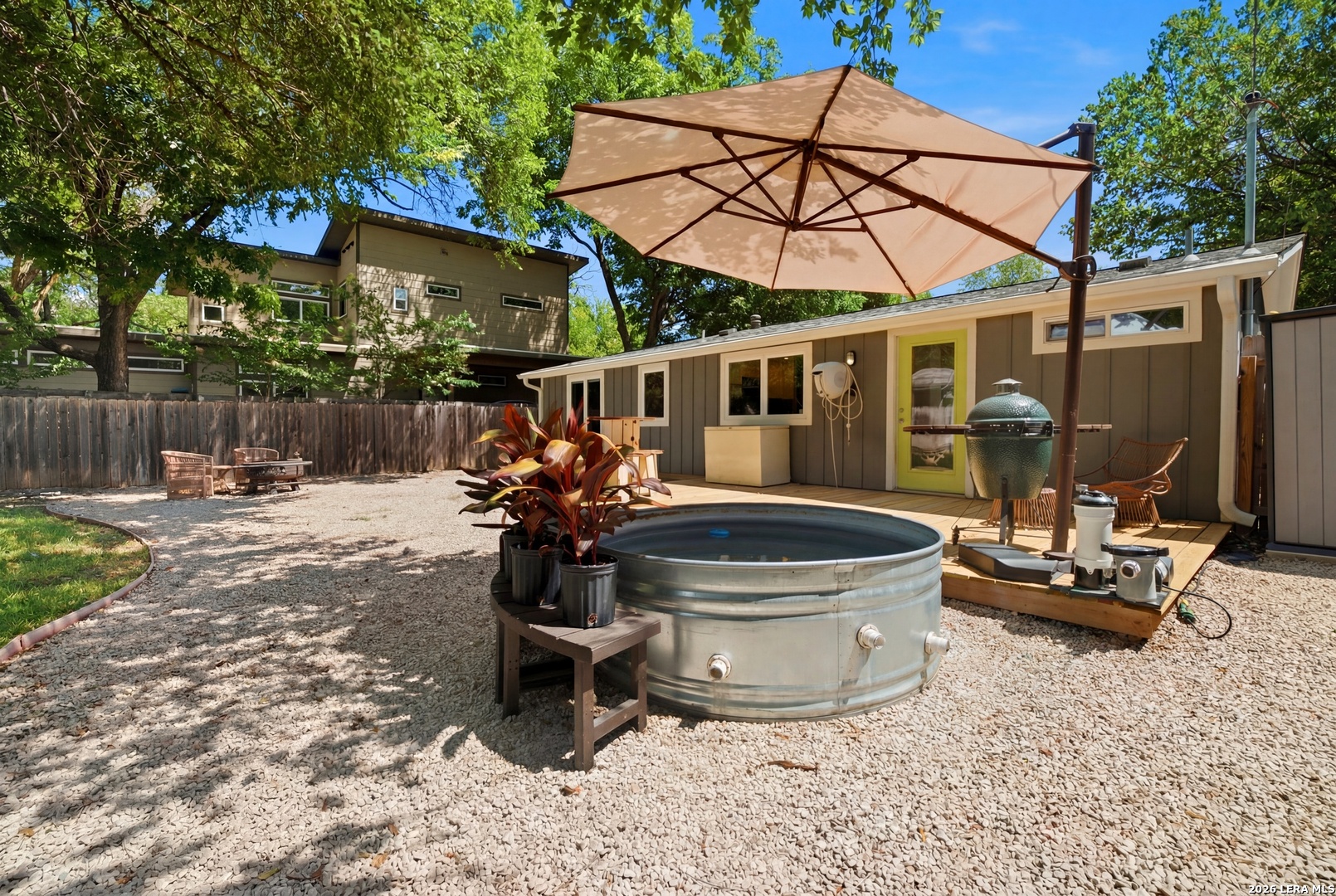 4610 Tanney Street Austin, TX 78721 - Photo 23 of 27 a view of a chair and tables in the patio
