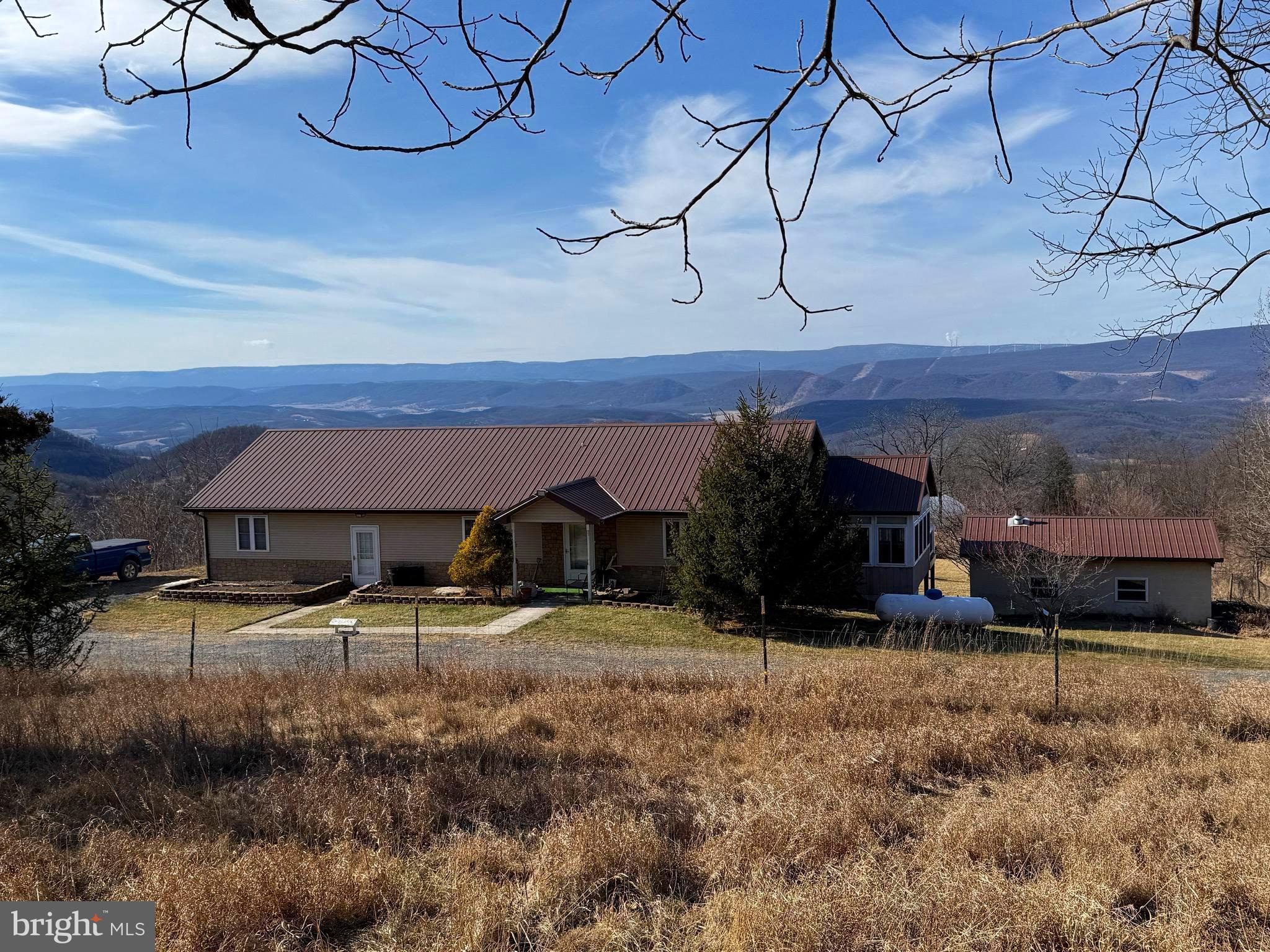 2717 Williamsport Road Burlington, WV 26710 - Photo 1 of 1 a view of a house with a snow