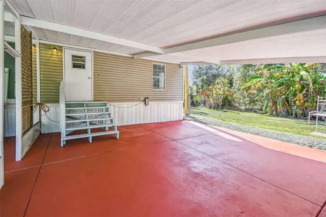 a view of a room with a large window