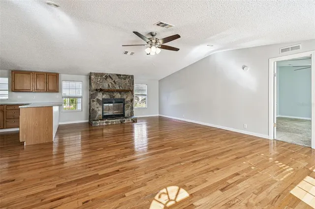 a view of a livingroom with furniture and wooden floor