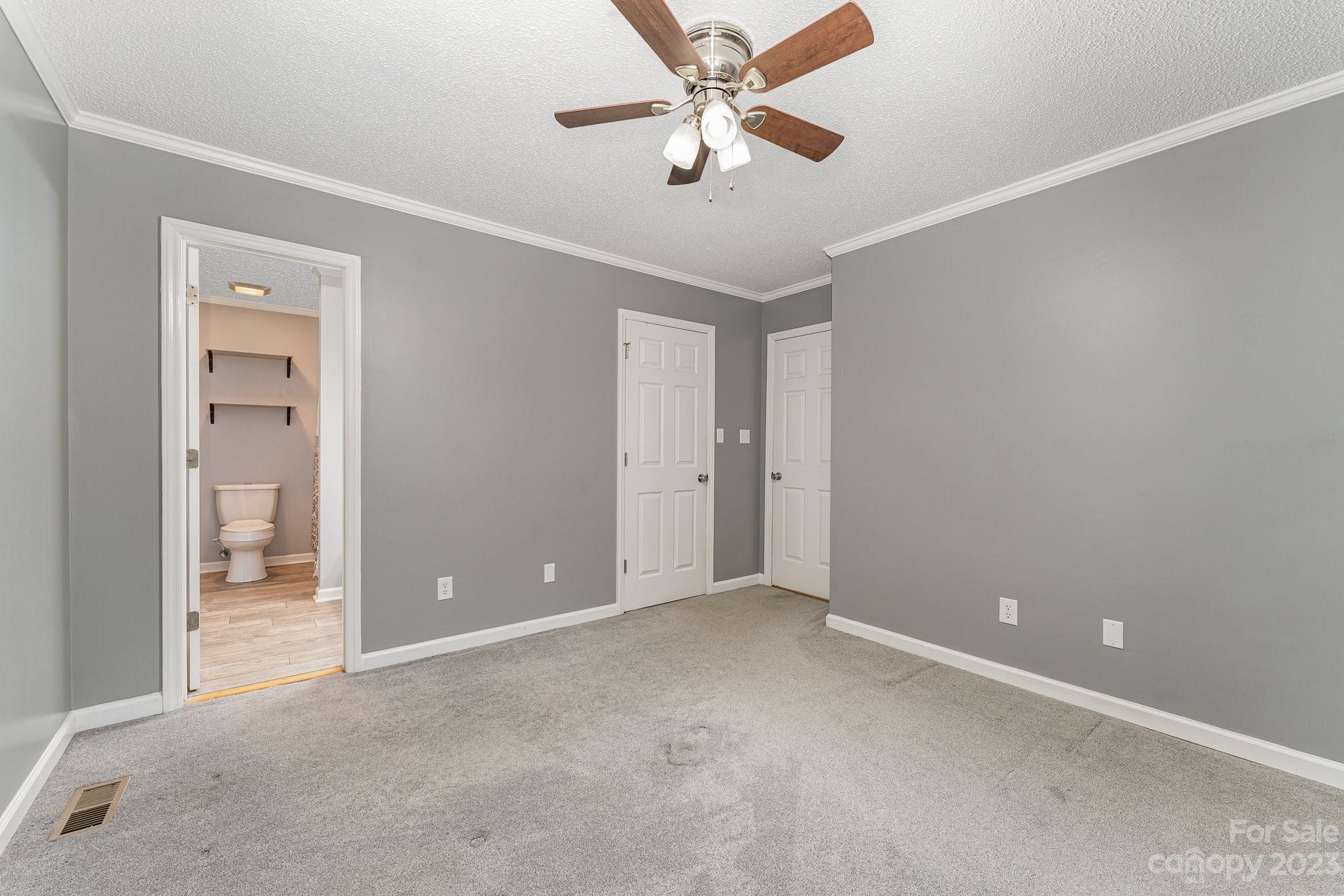 873 Gladstone Road Mocksville, NC 27028 - Photo 21 of 29 an empty room and a bathroom