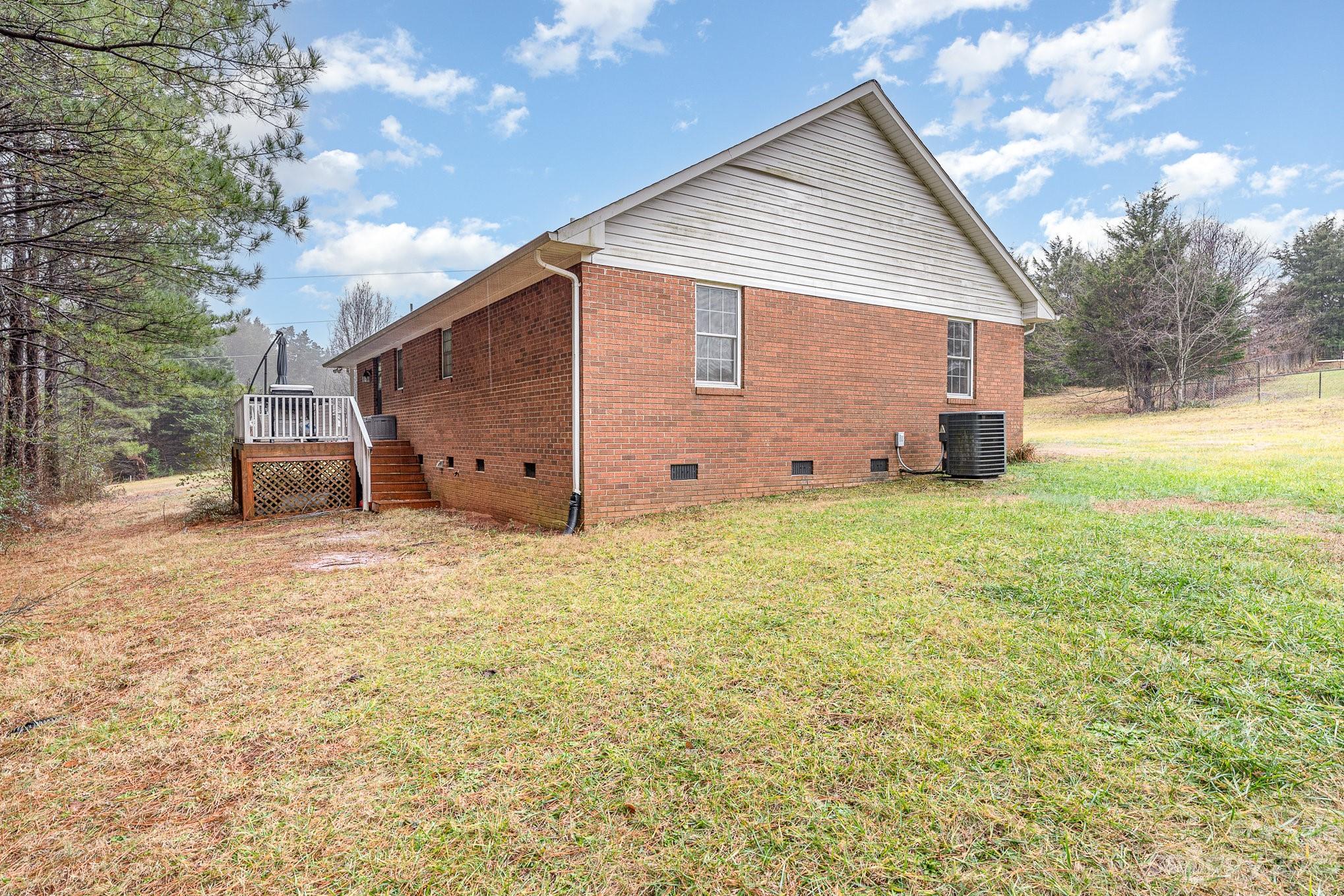 873 Gladstone Road Mocksville, NC 27028 - Photo 27 of 29 a view of a house with backyard