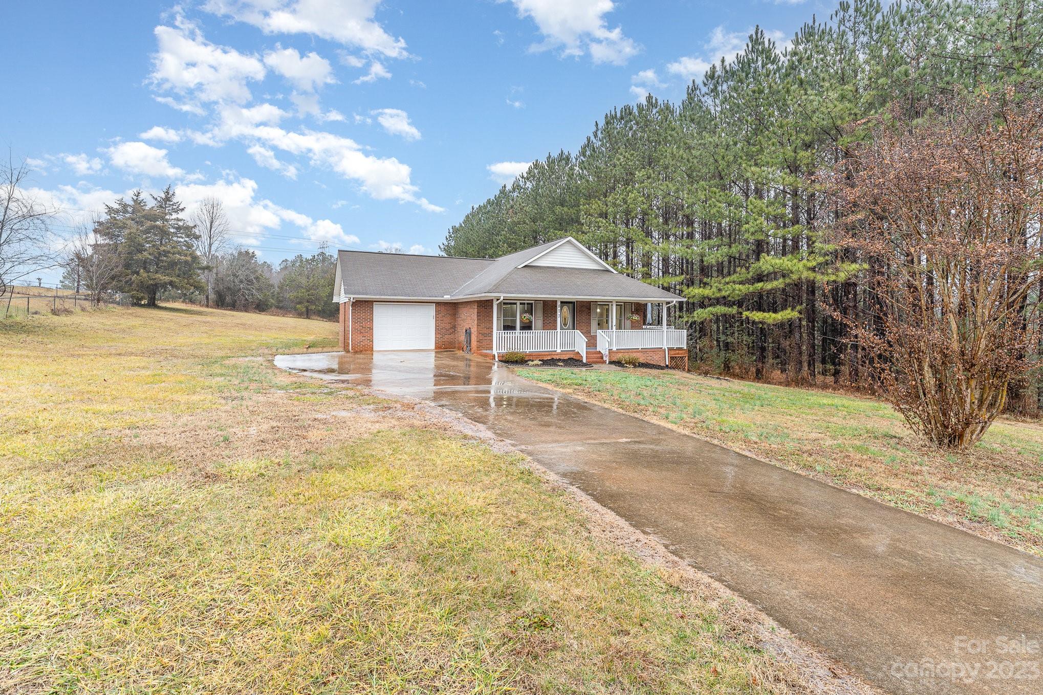 873 Gladstone Road Mocksville, NC 27028 - Photo 3 of 29 a view of a house with a yard