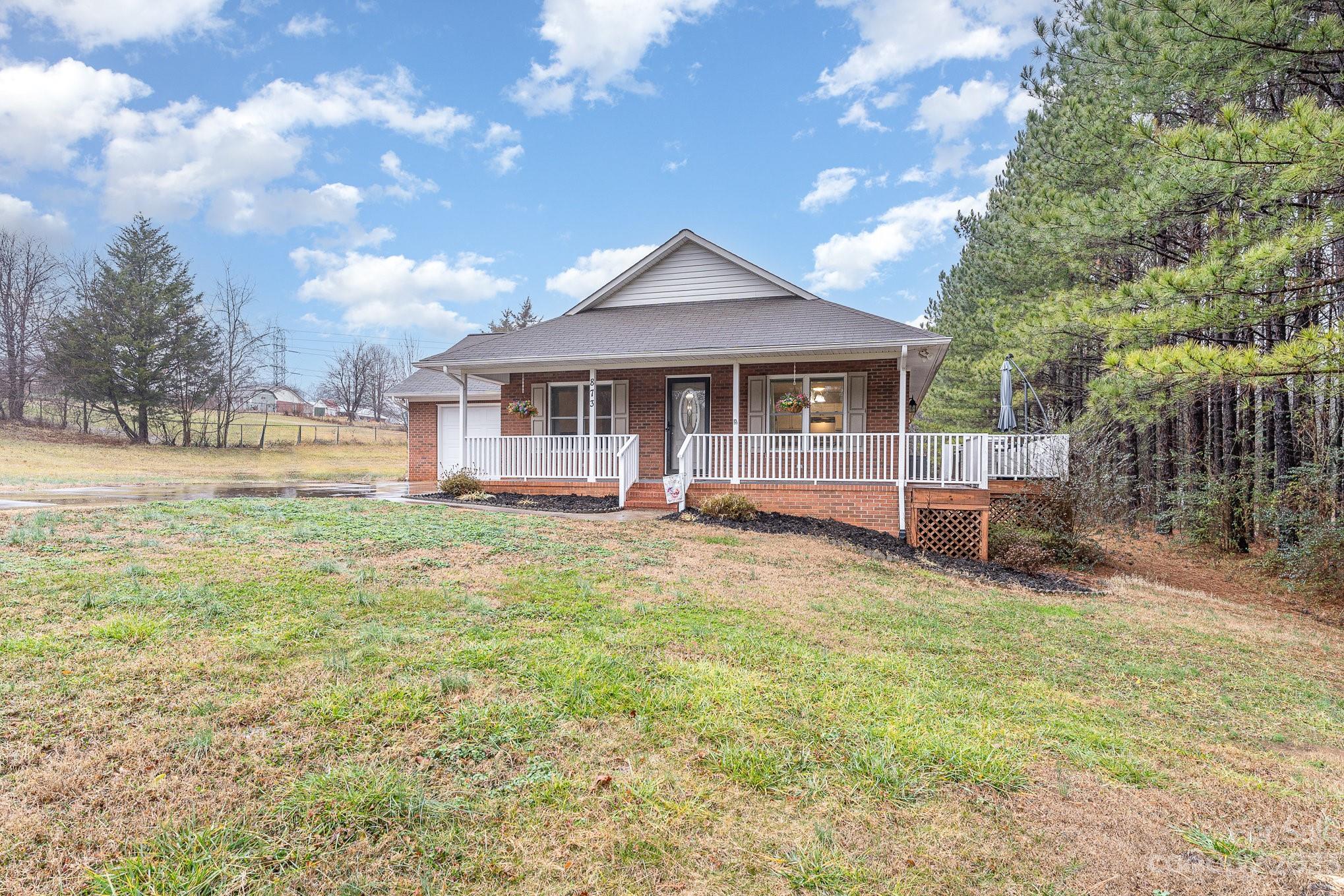 873 Gladstone Road Mocksville, NC 27028 - Photo 4 of 29 a view of a house with a yard