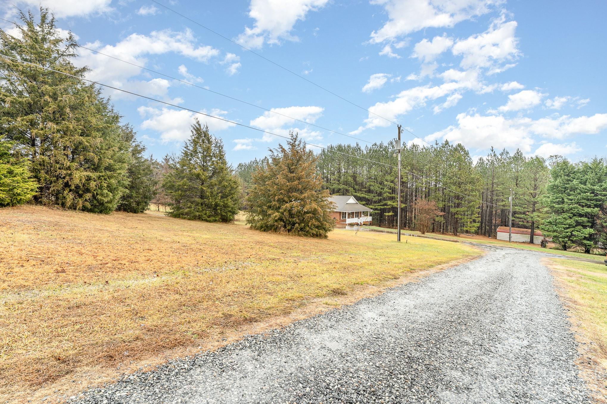 873 Gladstone Road Mocksville, NC 27028 - Photo 5 of 29 a view of outdoor space yard and swimming pool