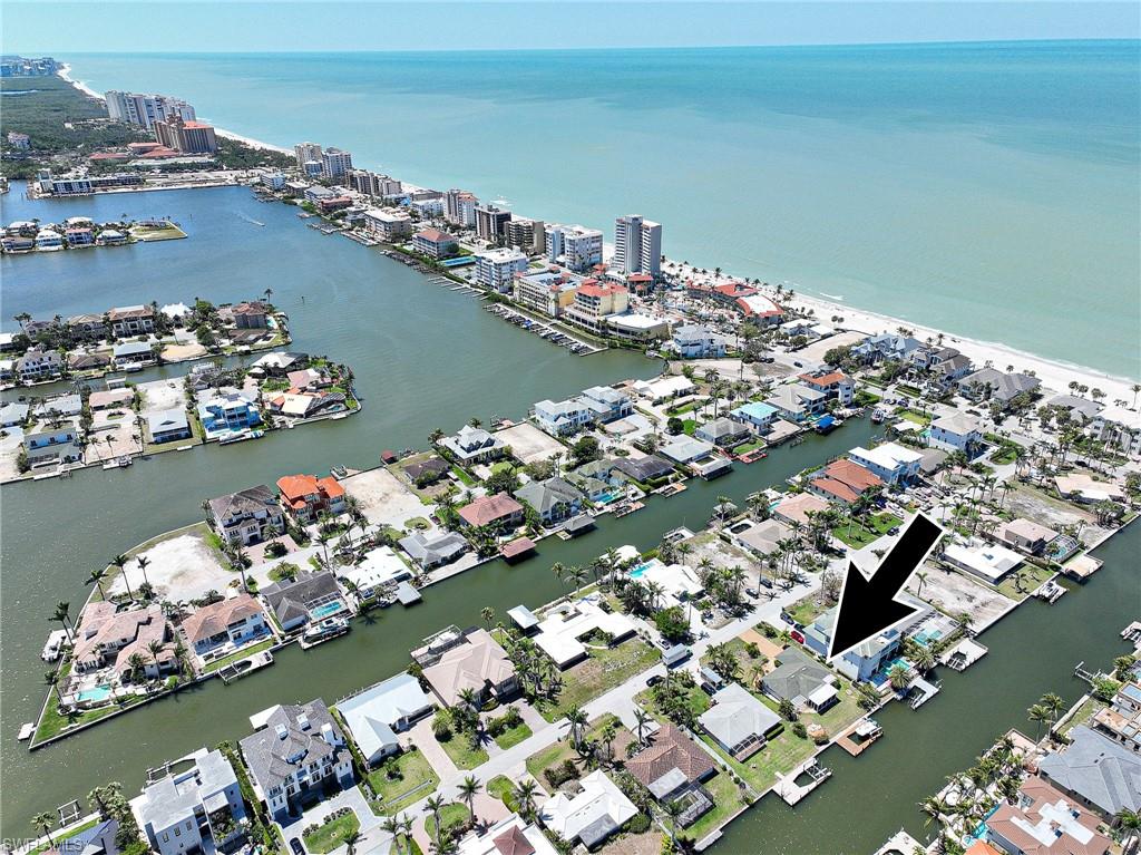 177 Channel Drive Naples, FL 34108 - Photo 11 of 23 an aerial view of a house with a ocean view