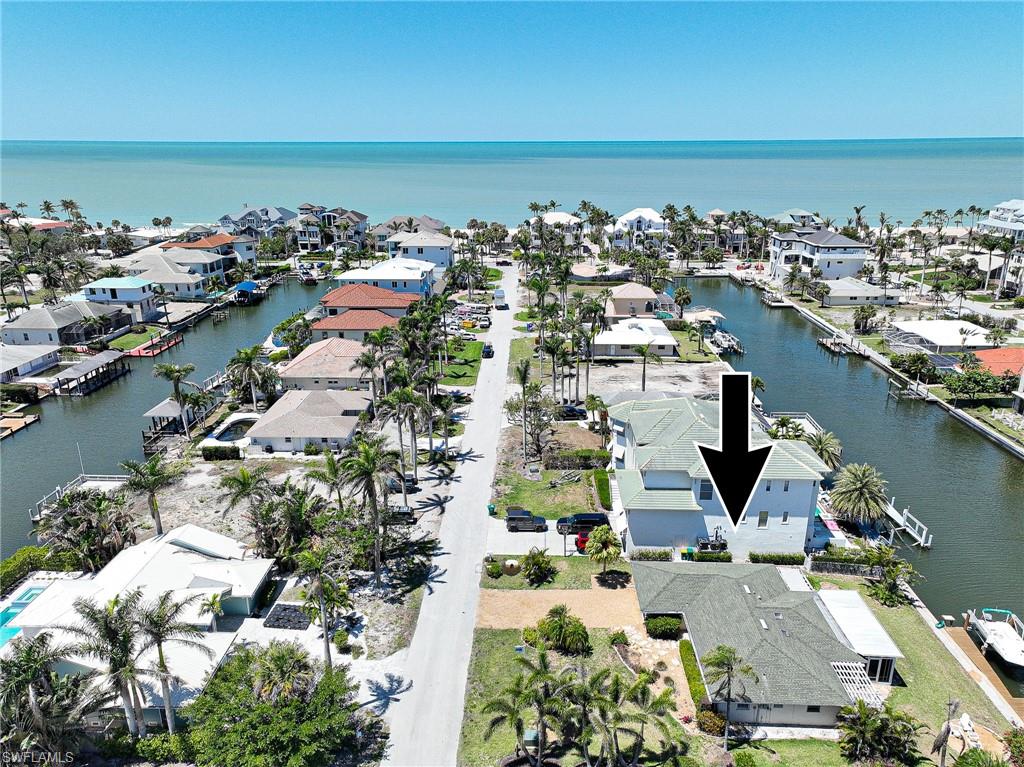 177 Channel Drive Naples, FL 34108 - Photo 13 of 23 an aerial view of a city with ocean view