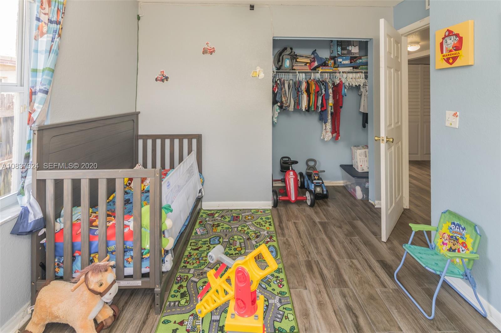 2220 Raleigh Street Hollywood, FL 33020 - Photo 13 of 23 a living room with lots of baby furniture