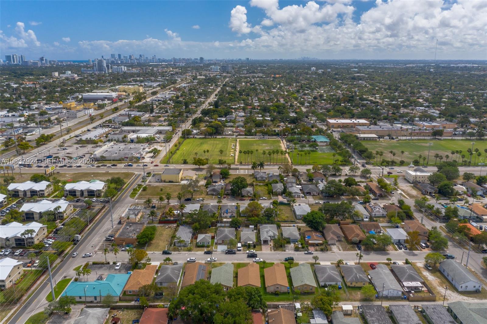 2220 Raleigh Street Hollywood, FL 33020 - Photo 21 of 23 an aerial view of residential building and lake