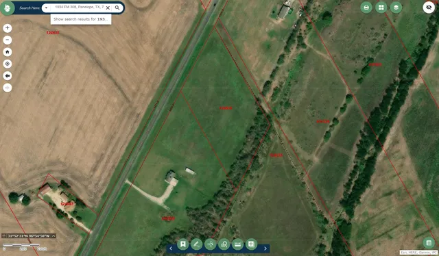 an aerial view of a residential houses with outdoor space