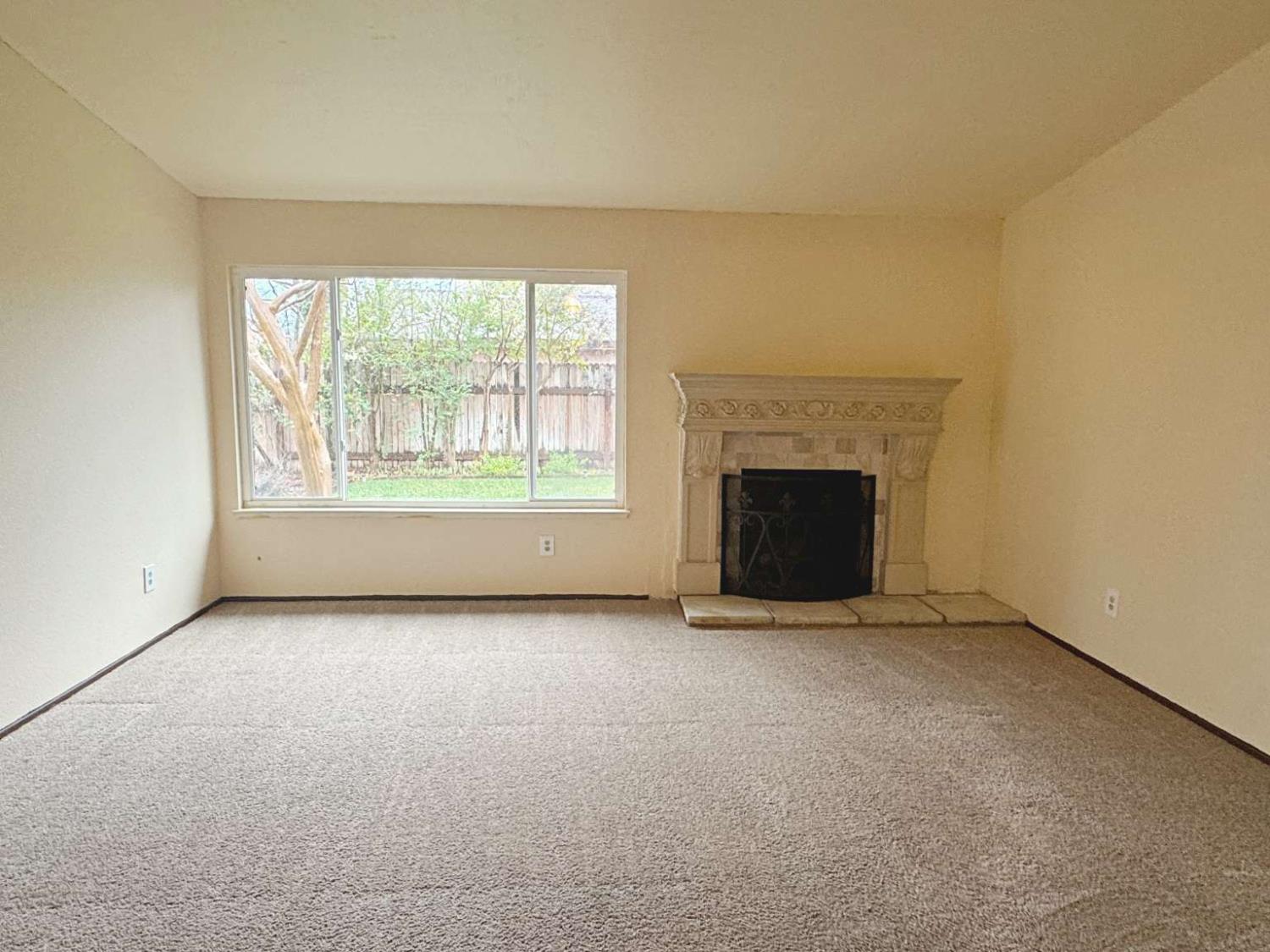 6249 Sunmist Way Citrus Heights, CA 95621 - Photo 19 of 24 an empty room with fireplace