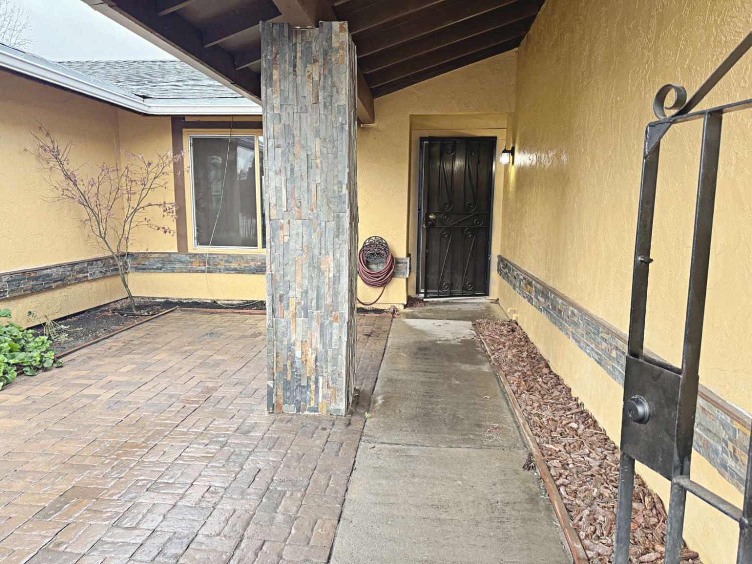 6249 Sunmist Way Citrus Heights, CA 95621 - Photo 3 of 24 a view of a porch with wooden floor and furniture