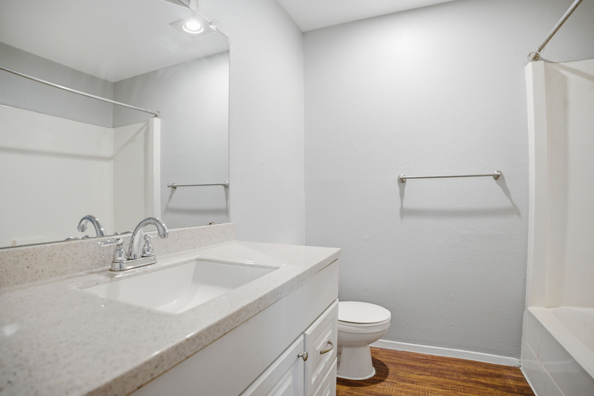 5204 Nuckols Crossing Road, Unit B Austin, TX 78744 - Photo 15 of 16 a bathroom with a sink toilet and vanity