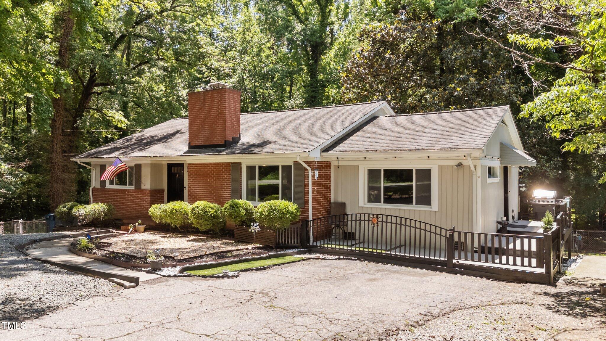 2005 Cole Mill Road Durham, NC 27705 - Photo 2 of 42 2-web-or-mls-DJI_20250530130836_0326_D