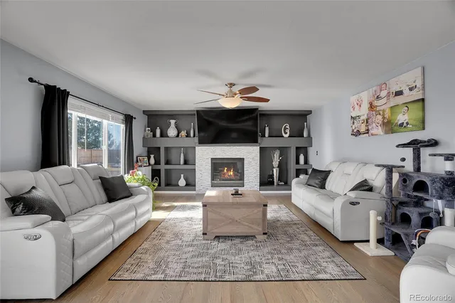 a kitchen with stainless steel appliances granite countertop a sink stove and microwave
