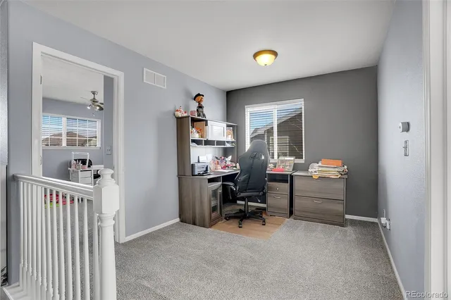 a front view of a house with patio