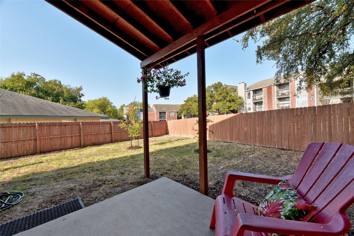 9716 Sugar Hill Drive, Unit A Austin, TX 78748 - Photo 33 of 40 Fenced backyard featuring a patio