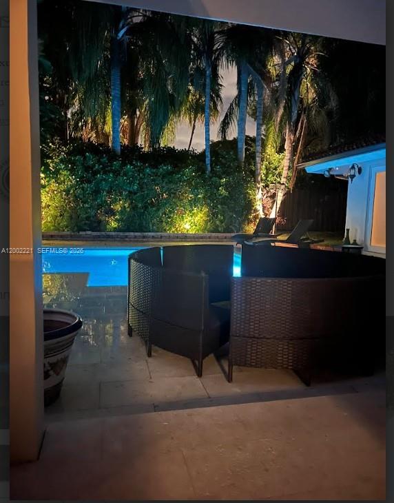 9941 Southwest 143rd Street Miami, FL 33176 - Photo 43 of 48 Another nighttime view of the pool from a distance