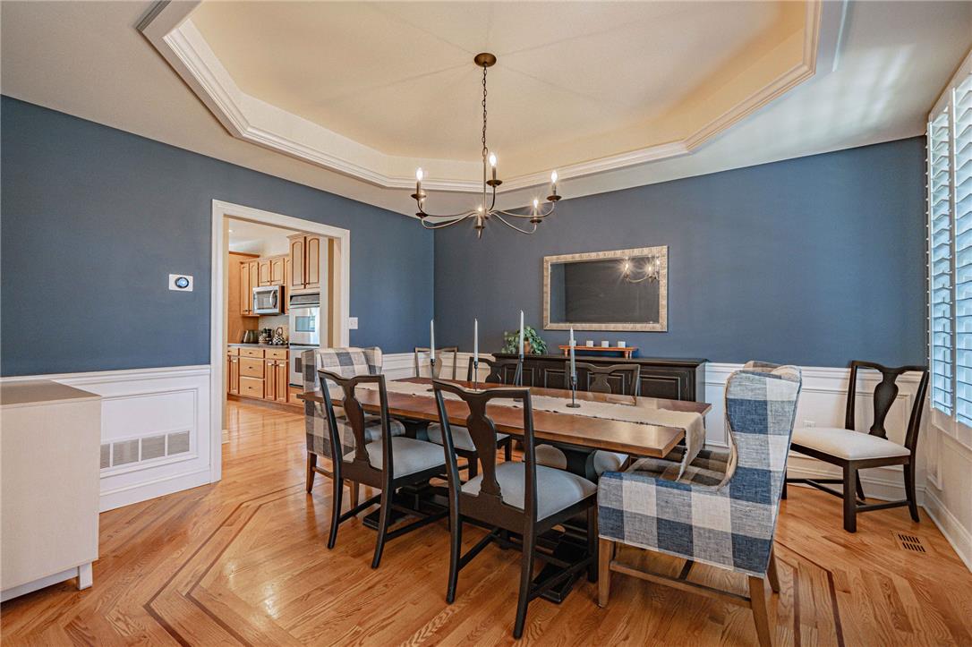 6000 Pond View Terrace Bath, PA 18014 - Photo 16 of 69 Hardwood floors with inlays extend through this elegant dining room, with trey ceiling.