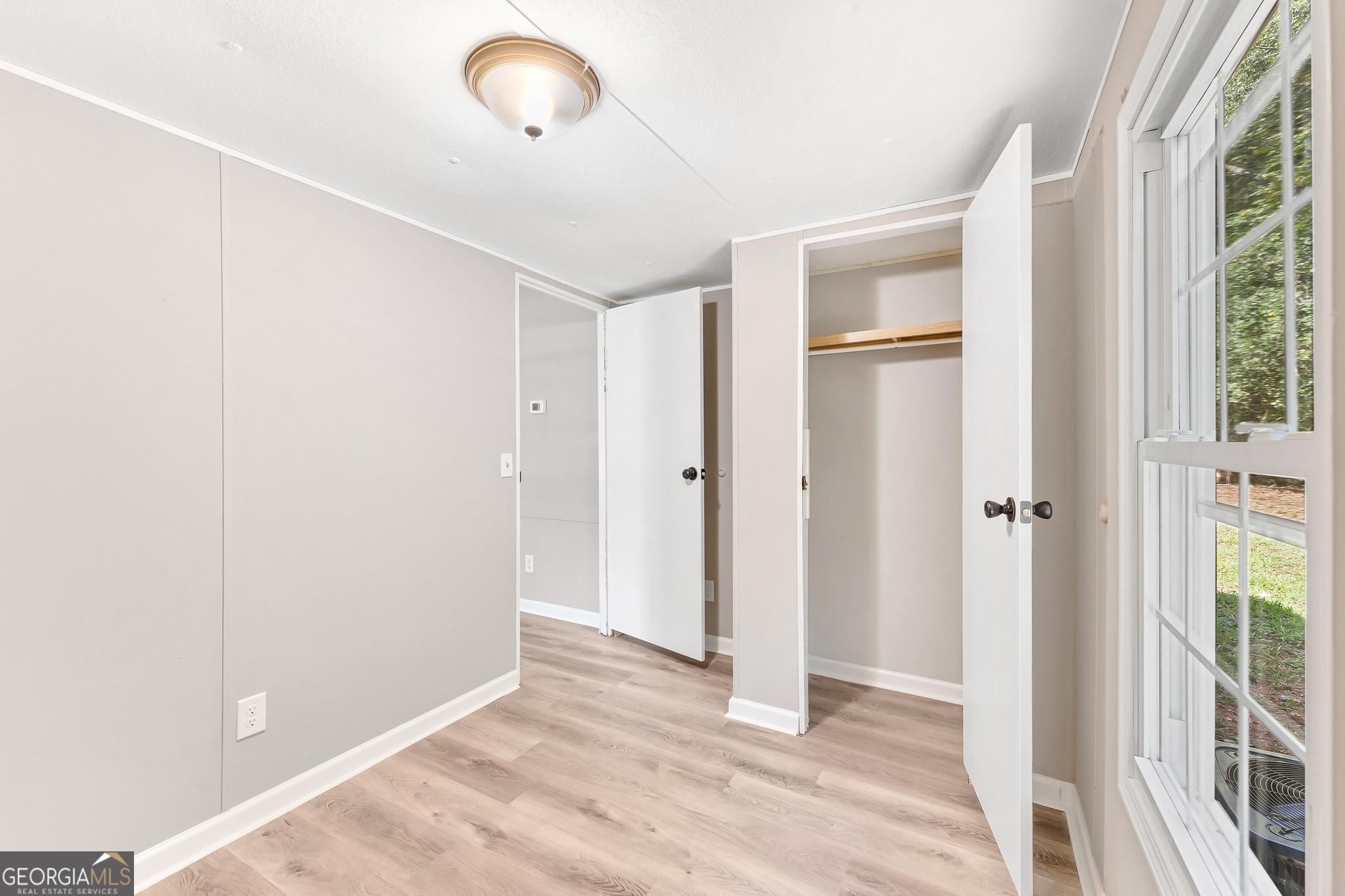 1528 Hodges Mill Road Hartwell, GA 30643 - Photo 24 of 37 a view of an empty room and window