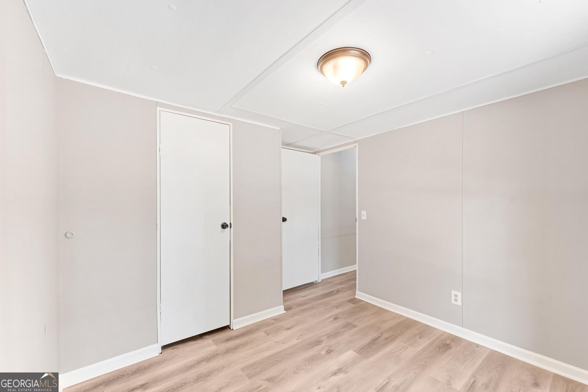 1528 Hodges Mill Road Hartwell, GA 30643 - Photo 26 of 37 a view of a room with wooden floor