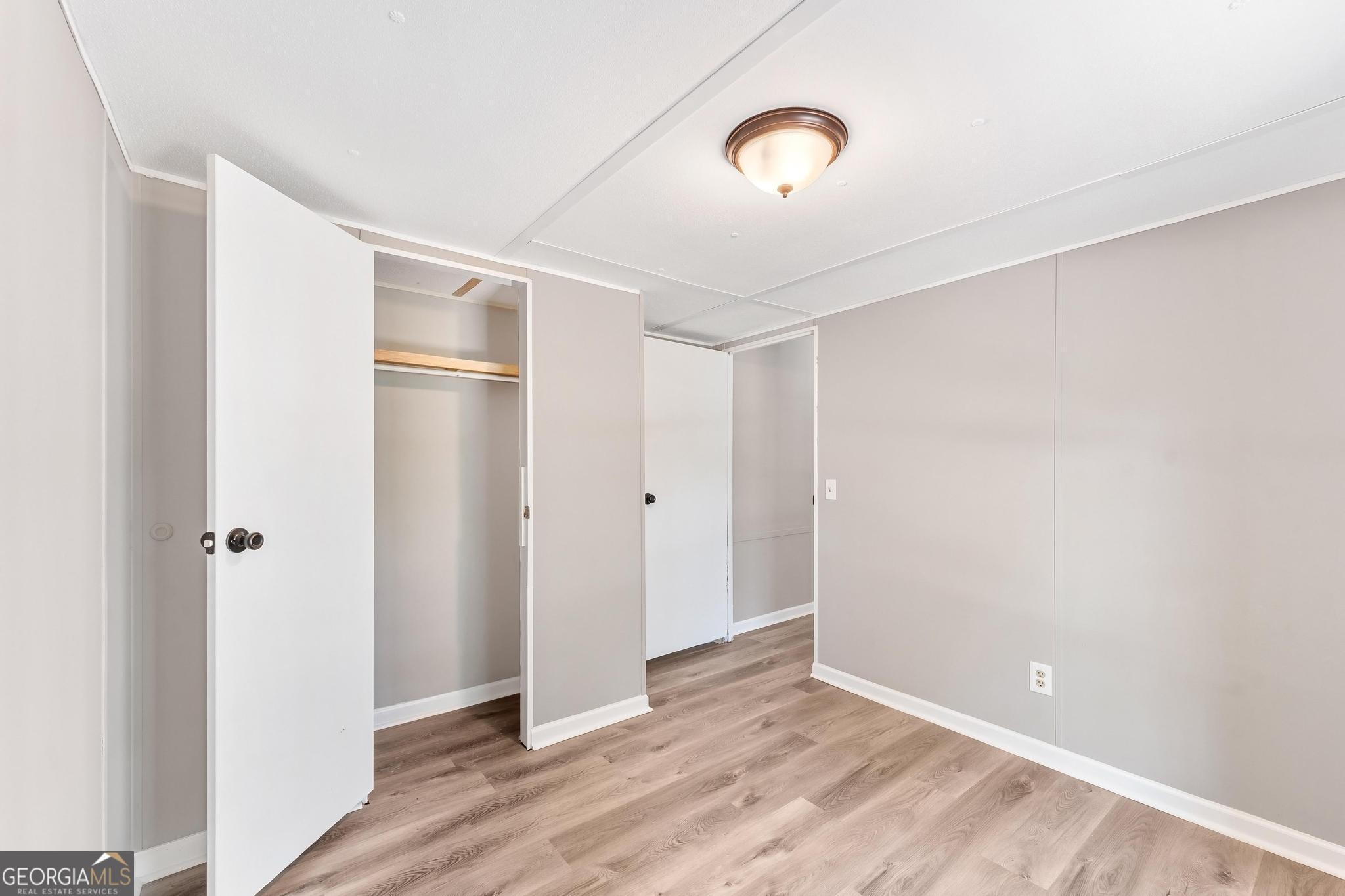 1528 Hodges Mill Road Hartwell, GA 30643 - Photo 27 of 37 a view of empty room with wooden floor