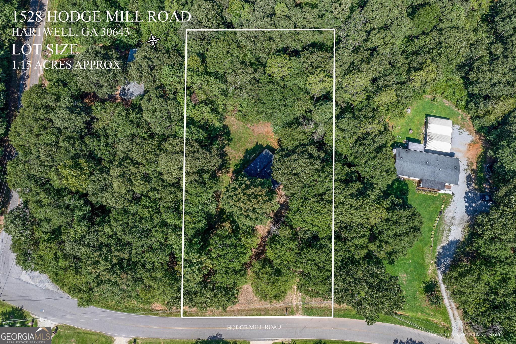 1528 Hodges Mill Road Hartwell, GA 30643 - Photo 30 of 37 an aerial view of a house with a yard