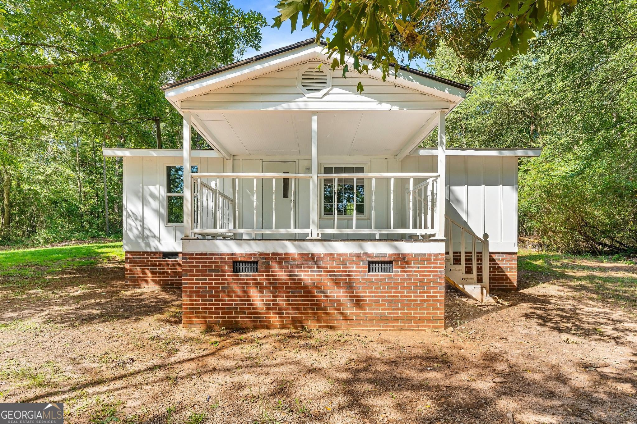 1528 Hodges Mill Road Hartwell, GA 30643 - Photo 3 of 37 a view of a backyard with large tree