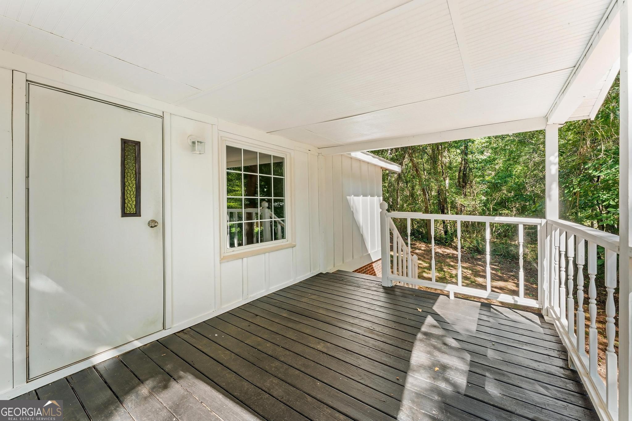 1528 Hodges Mill Road Hartwell, GA 30643 - Photo 5 of 37 a view of a balcony with wooden floor