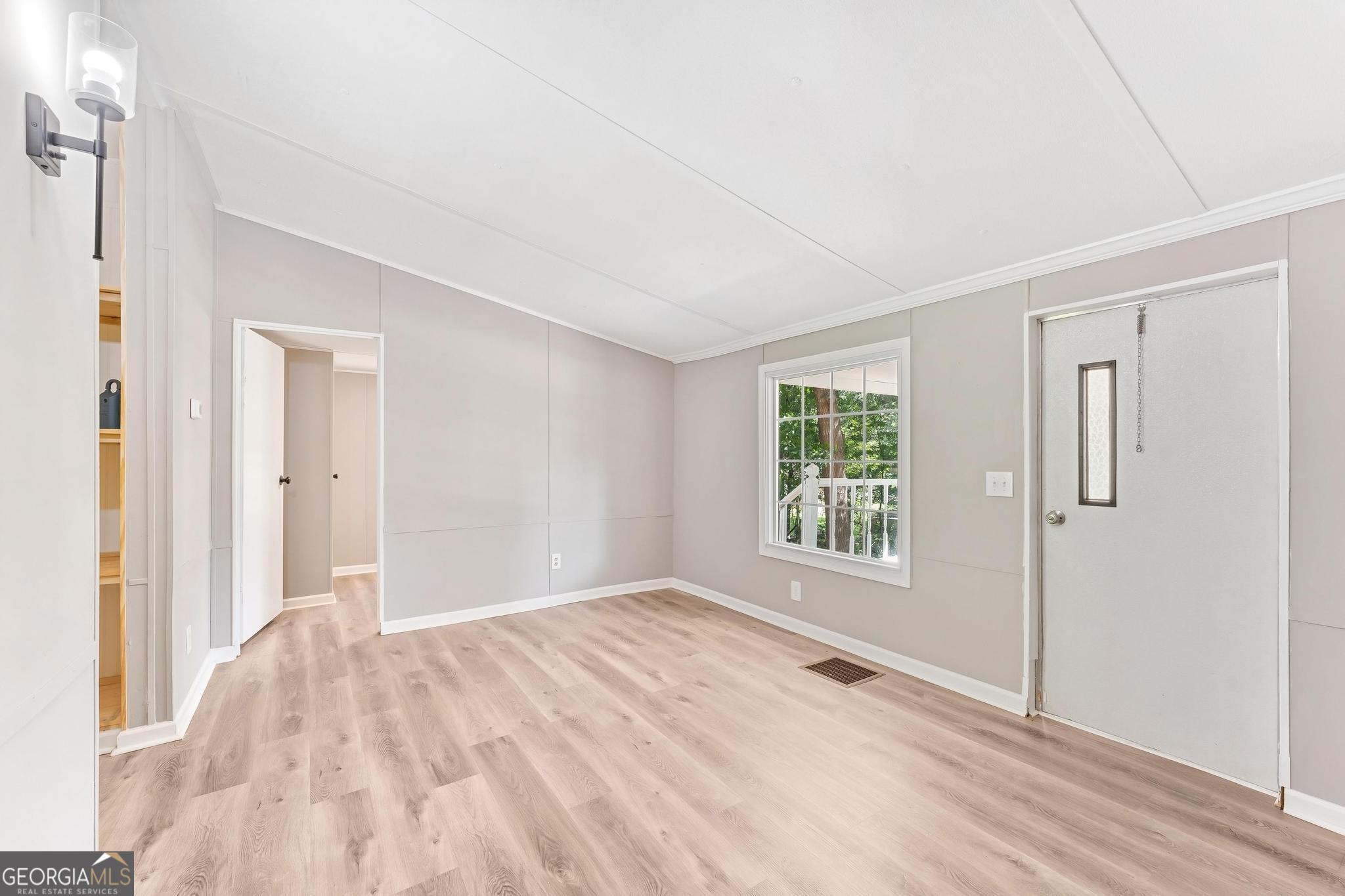 1528 Hodges Mill Road Hartwell, GA 30643 - Photo 7 of 37 a view of a room with a large window