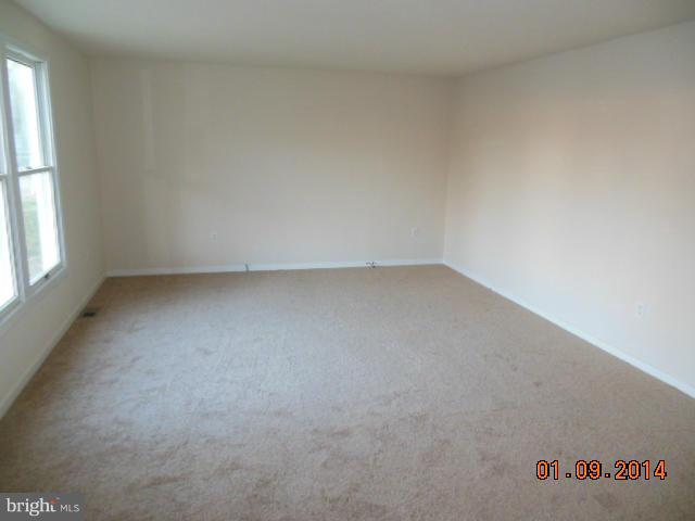 155 Lea Road Colonial Beach, VA 22443 - Photo 4 of 13 an empty room with a window