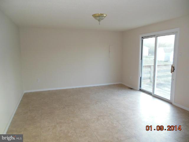 155 Lea Road Colonial Beach, VA 22443 - Photo 5 of 13 a view of an empty room with a window