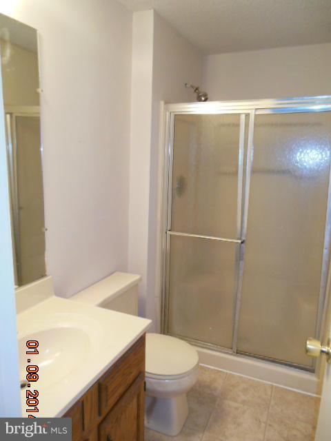 155 Lea Road Colonial Beach, VA 22443 - Photo 7 of 13 a bathroom with a shower and a toilet