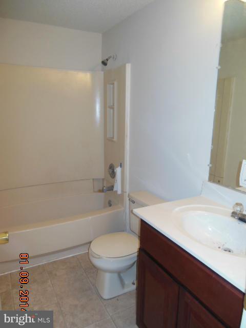 155 Lea Road Colonial Beach, VA 22443 - Photo 9 of 13 a bathroom with a sink a toilet and a bathtub