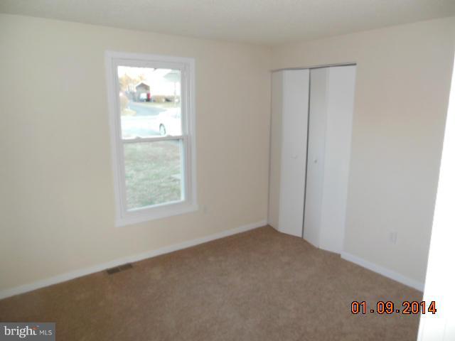 155 Lea Road Colonial Beach, VA 22443 - Photo 10 of 13 a view of an empty room with a window