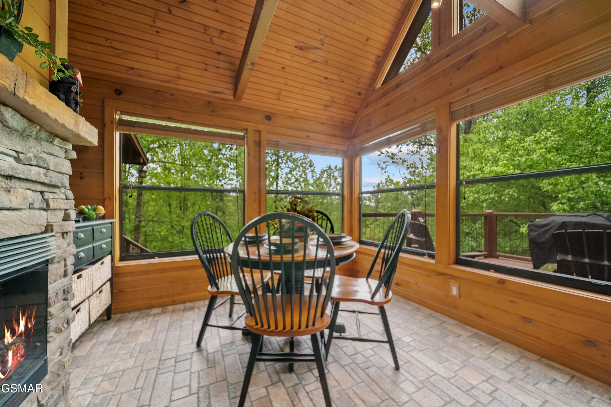 1732 Ridgecrest Drive Sevierville, TN 37876 - Photo 18 of 28 a patio with yard glass top table and chairs