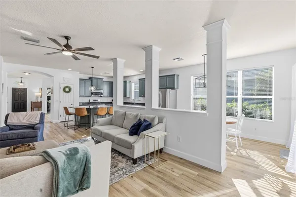 a kitchen with stainless steel appliances granite countertop a stove and refrigerator