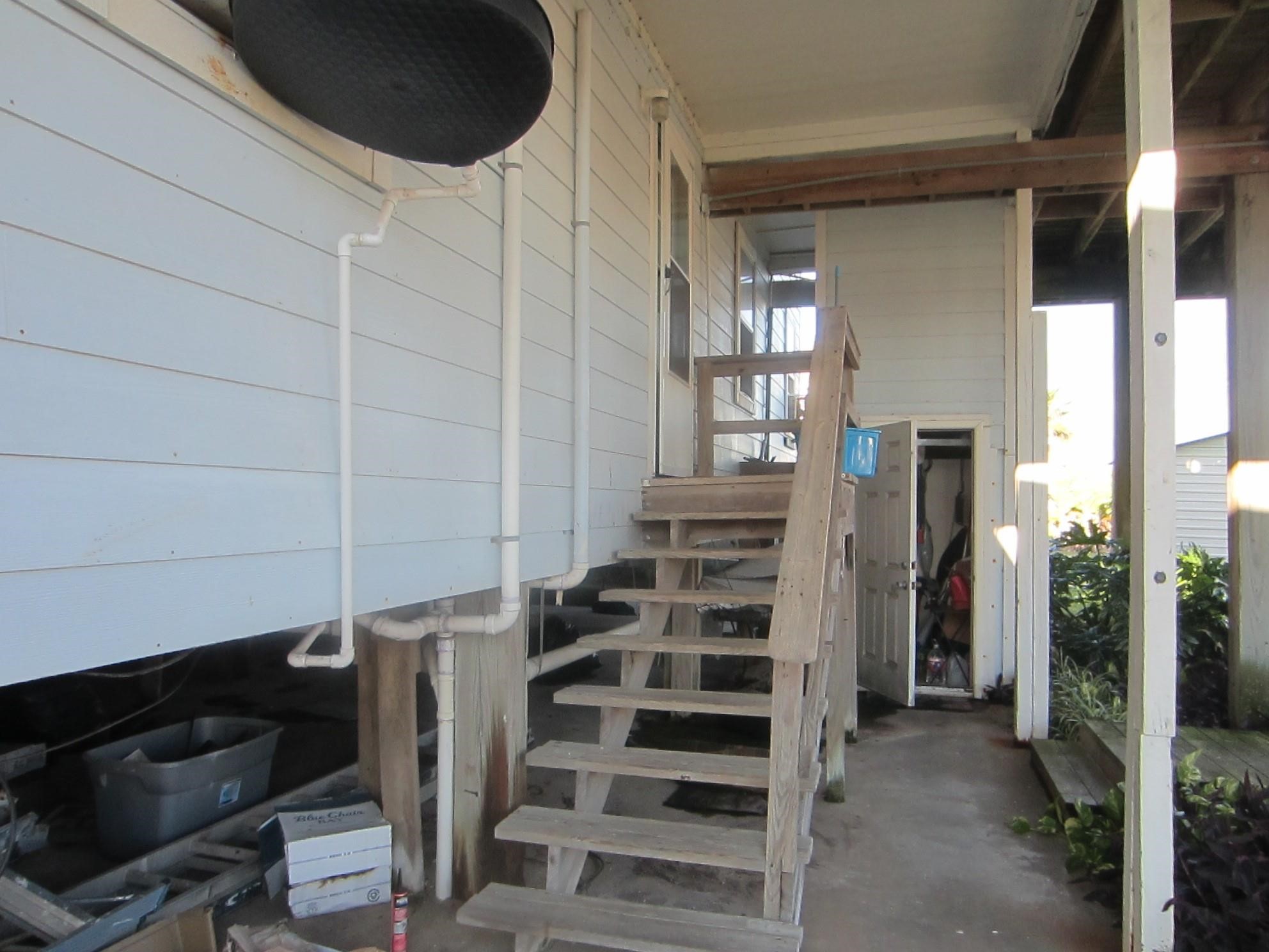 314 Shark Lane Surfside Beach, TX 77541 - Photo 4 of 12 a view of walk in closet with clothes and shoes
