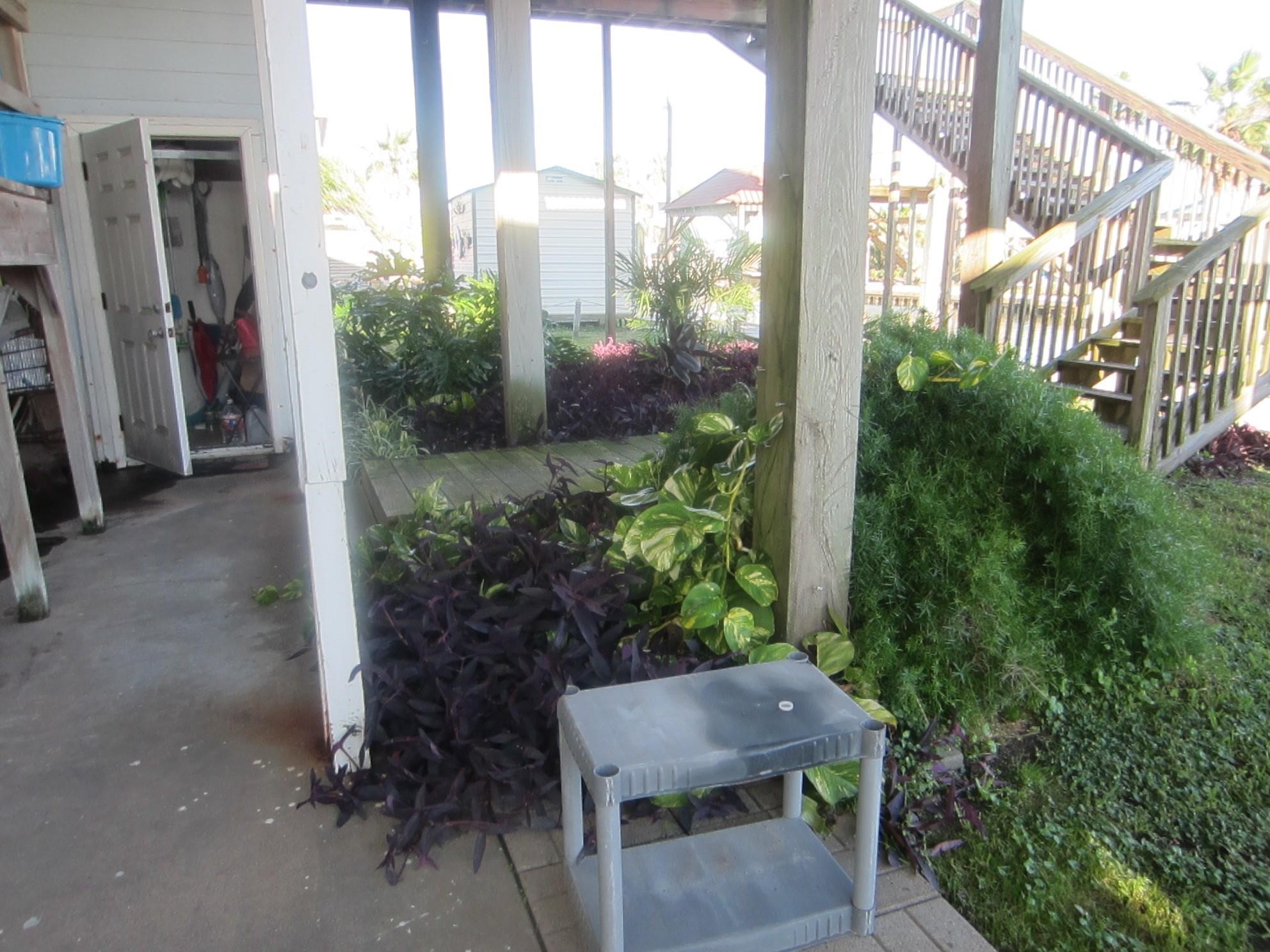 314 Shark Lane Surfside Beach, TX 77541 - Photo 8 of 12 a view of balcony and patio