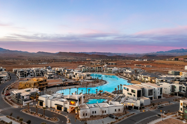 762 West Periwinkle Lane, Unit 102 St. George, UT 84790 - Photo 35 of 40 Drone / aerial view of a mountain backdrop and a pool