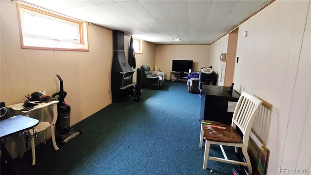 a view of a house with a yard and plants