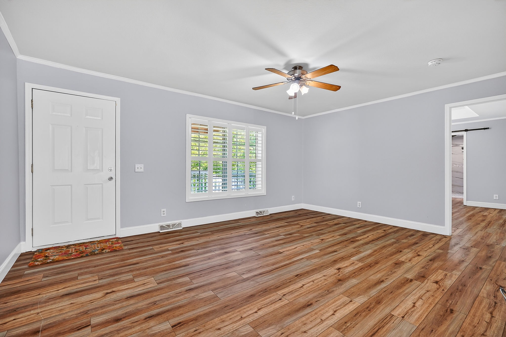 16130 Buffalo Valley Road Silver Point, TN 38582 - Photo 22 of 47 wooden floor in an empty room with a window