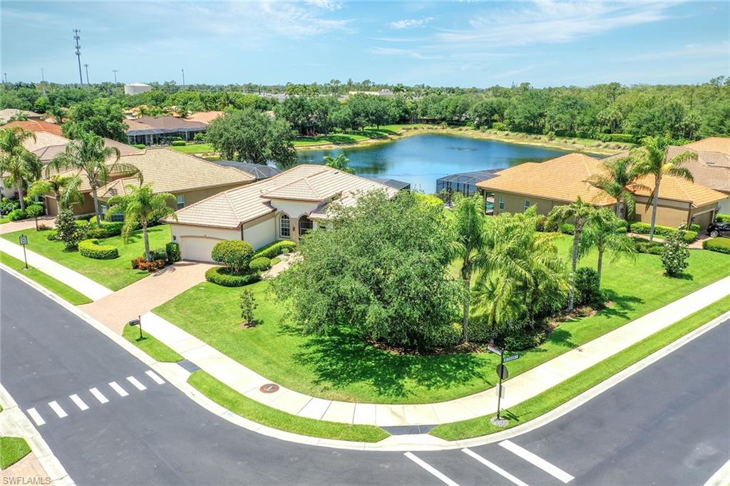 Undisclosed Address Naples, FL 34113 - Photo 3 of 30 a view of a lake with a outdoor space